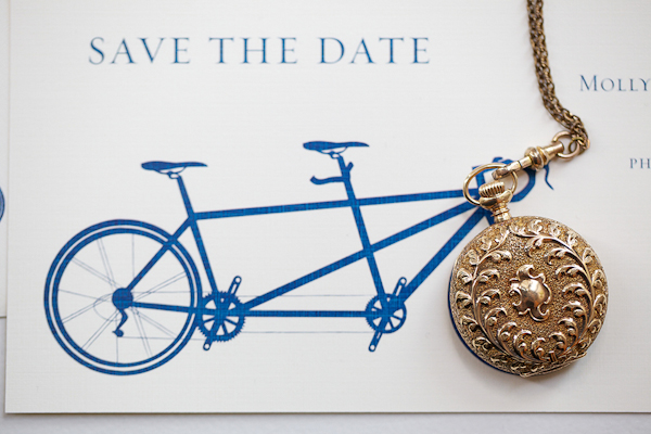 white and blue save the date with tandem bicycle and locket - wedding photo by top Philadelphia based wedding photographers Langdon Photography